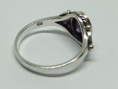 WOW !! A DELIGHTFUL SOLID STERLING SILVER RING SET WITH A FACETED PURPLE STONE !! SUCH A BEAUTY !!