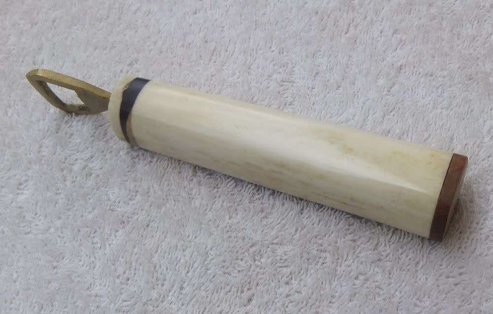 WOW !! AN AWESOME VINTAGE GENUINE BONE & WOOD HANDLE BOTTLE OPENER WITH RHINO ENGRAVING !!