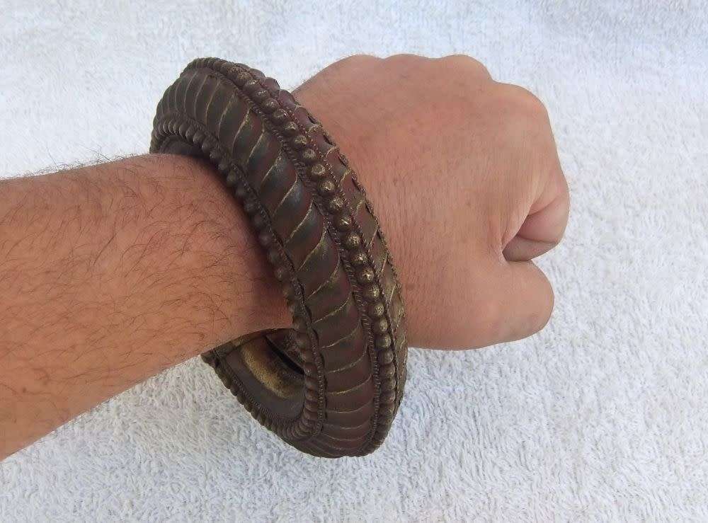 TRUE ANTIQUE !! A NORTH AFRICAN SLAVE BANGLE MADE OF A BRONZE LOOK HEAVY METAL !! RARE FIND !!