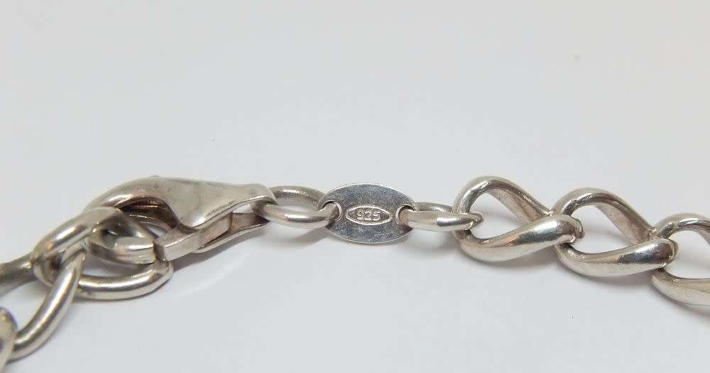 AN AWESOME QUALITY SOLID STERLING SILVER BRACELET IN GREAT CONDITION !! FULLY STAMPED AND TESTED !!