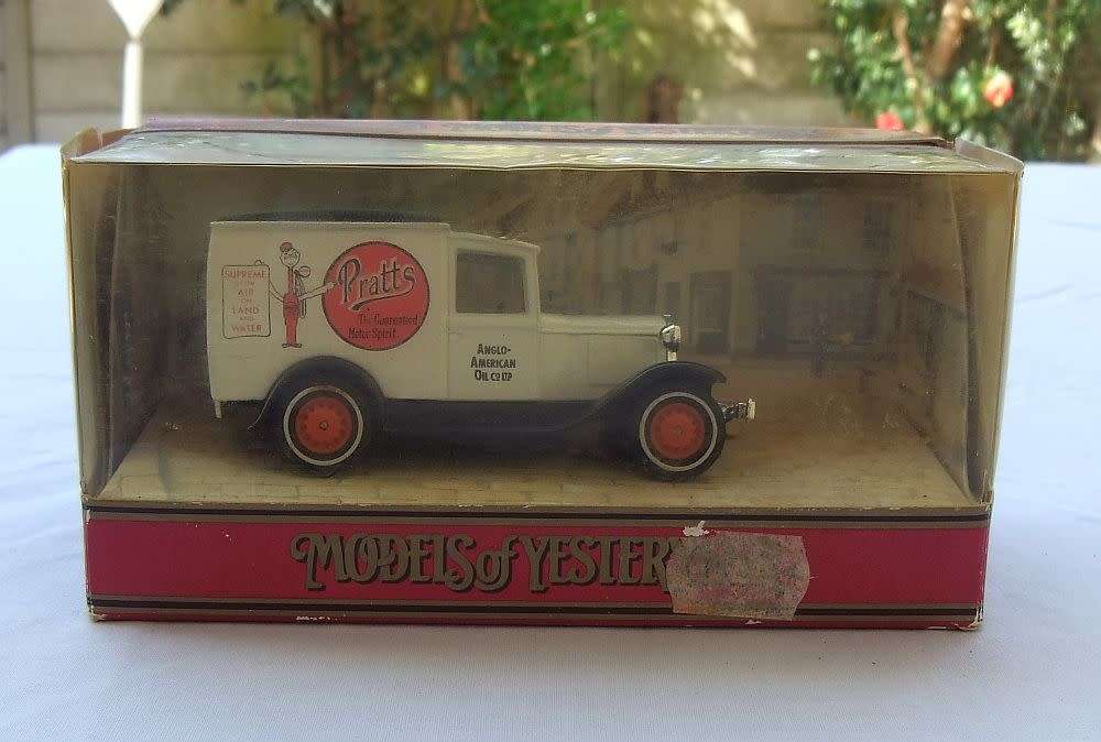 A VINTAGE DIE CAST METAL MODEL OF THE 1930 MODEL `A` FORD VAN BY MATCHBOX MODELS OF YESTERYEAR