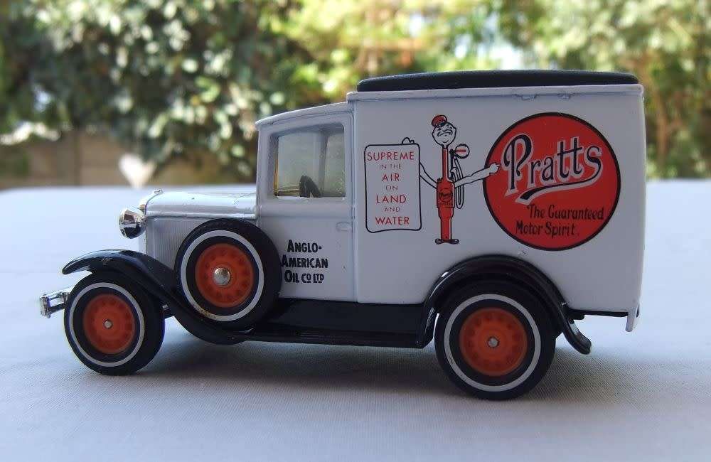 A VINTAGE DIE CAST METAL MODEL OF THE 1930 MODEL `A` FORD VAN BY MATCHBOX MODELS OF YESTERYEAR