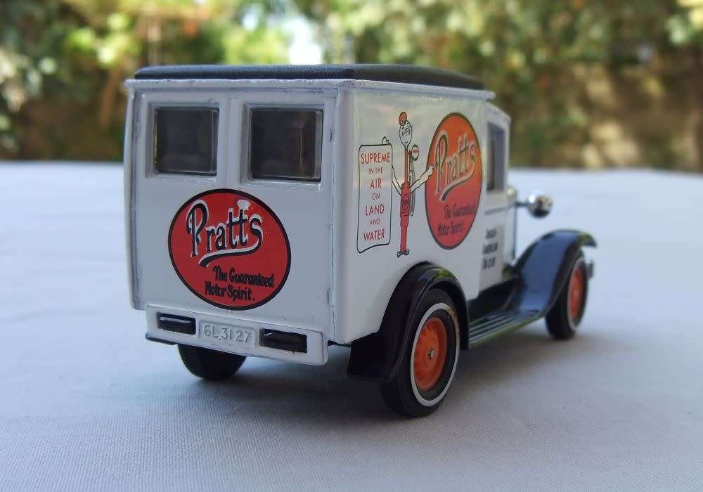 A VINTAGE DIE CAST METAL MODEL OF THE 1930 MODEL `A` FORD VAN BY MATCHBOX MODELS OF YESTERYEAR