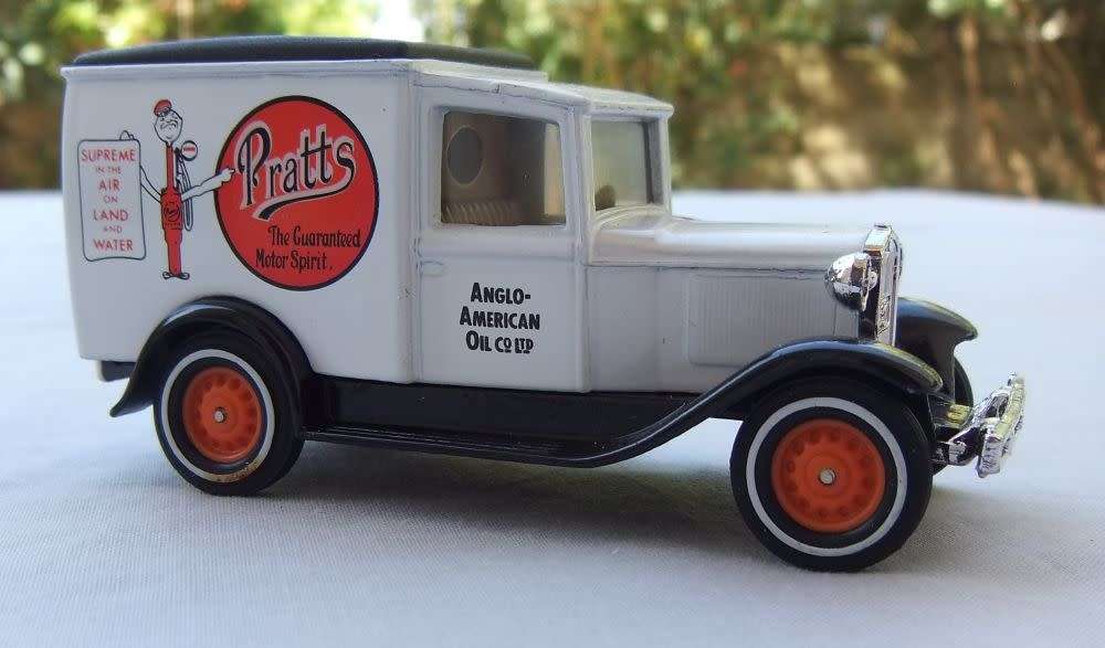 A VINTAGE DIE CAST METAL MODEL OF THE 1930 MODEL `A` FORD VAN BY MATCHBOX MODELS OF YESTERYEAR