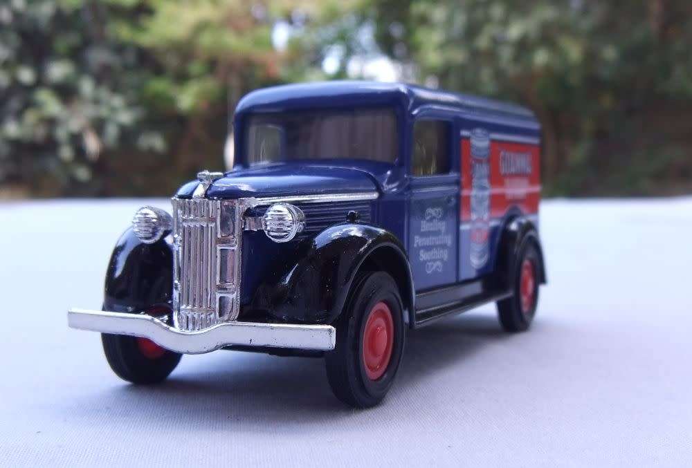 A VINTAGE DIE CAST METAL MODEL OF THE 1937 G.M.C VAN BY MATCHBOX MODELS OF YESTERYEAR