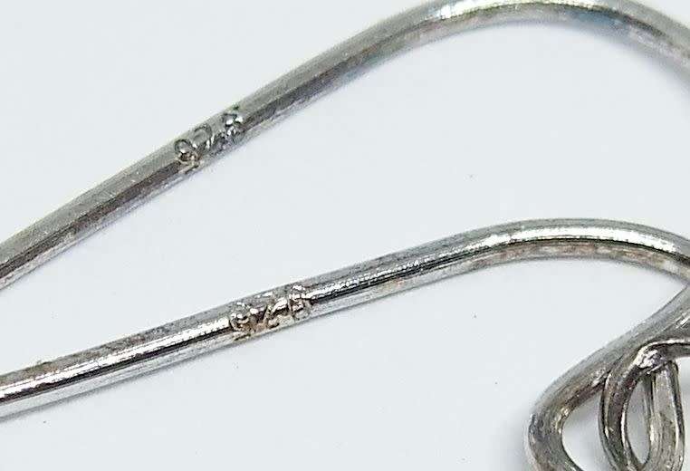 A pair of genuine sterling silver and freshwater pearl earrings - Never worn - With box