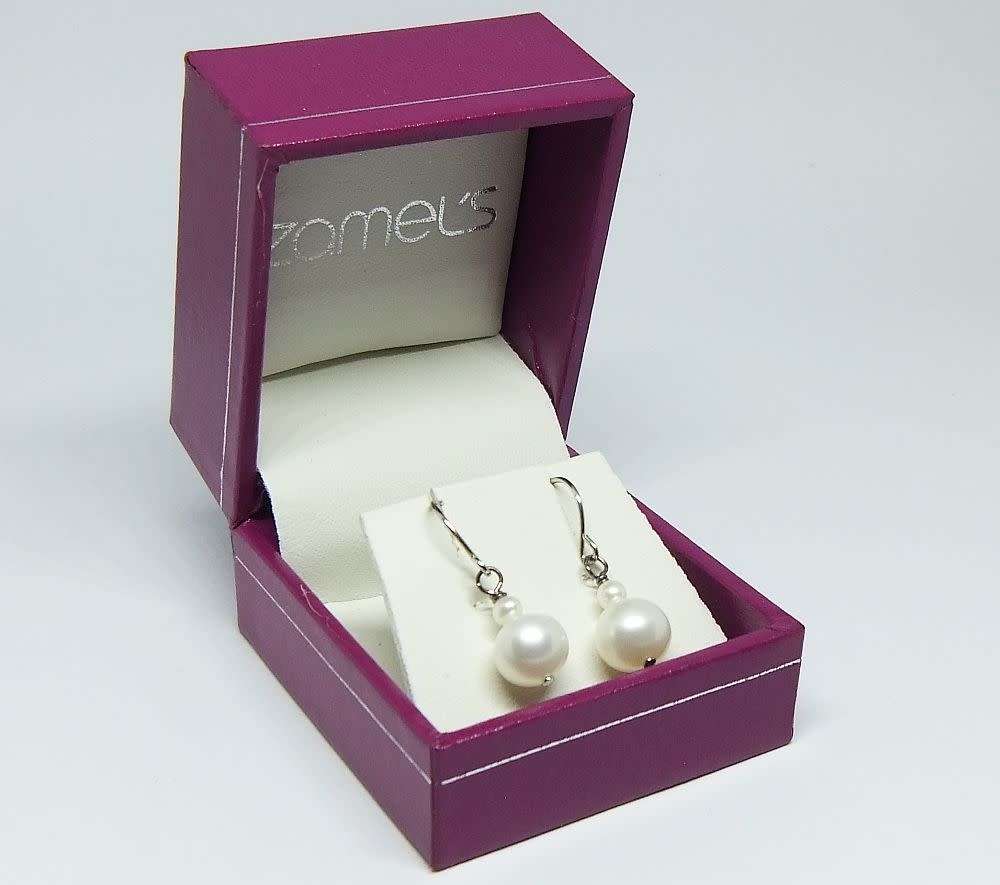 A pair of genuine sterling silver and freshwater pearl earrings - Never worn - With box