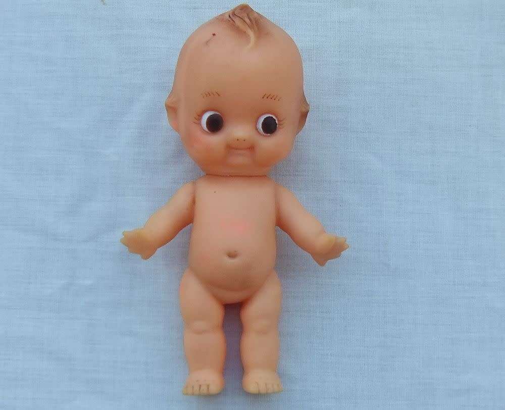 Three vintage Kewpie dolls for display