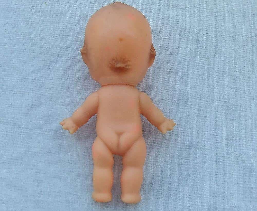 Three vintage Kewpie dolls for display