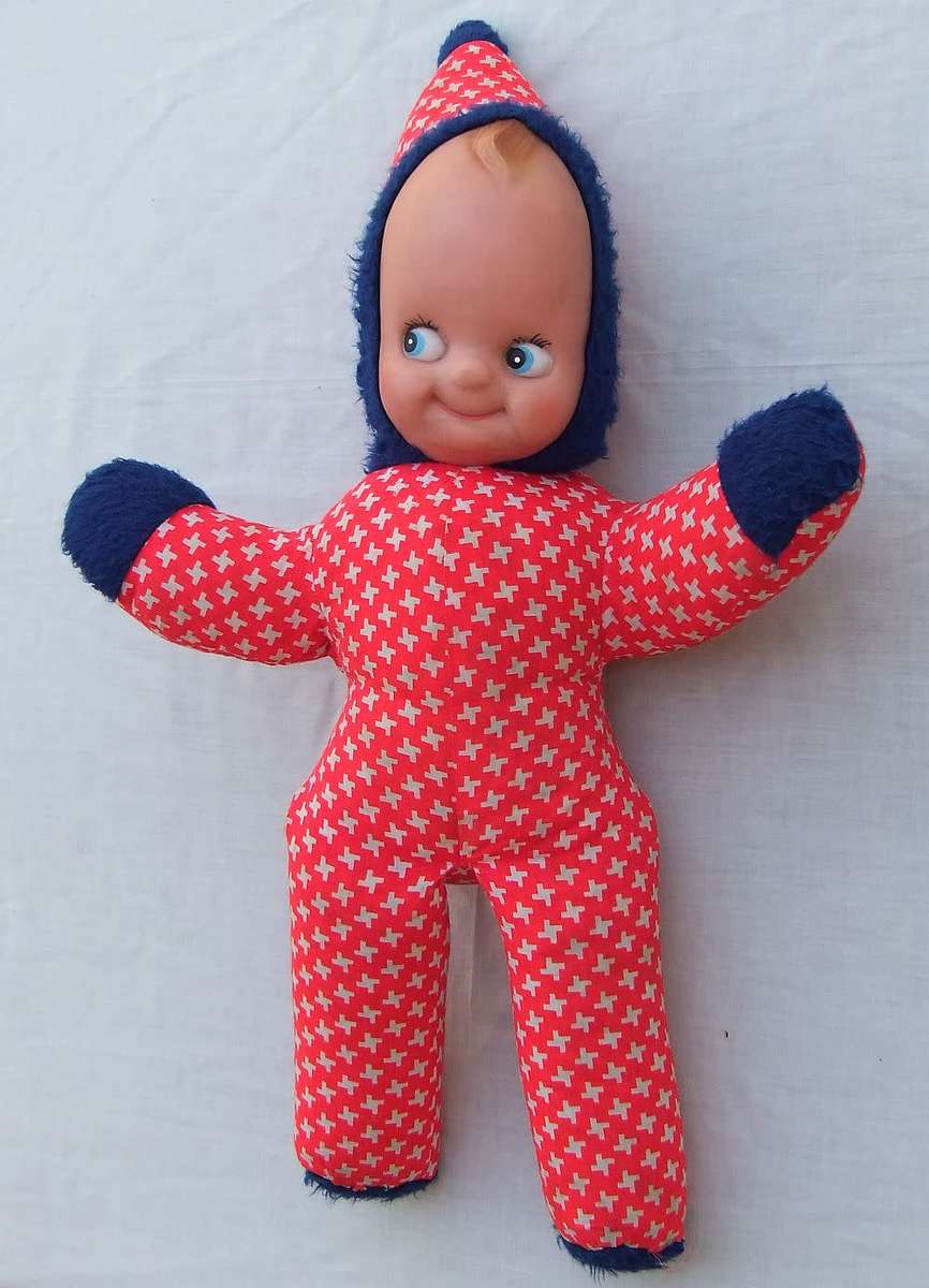 Three vintage Kewpie dolls for display