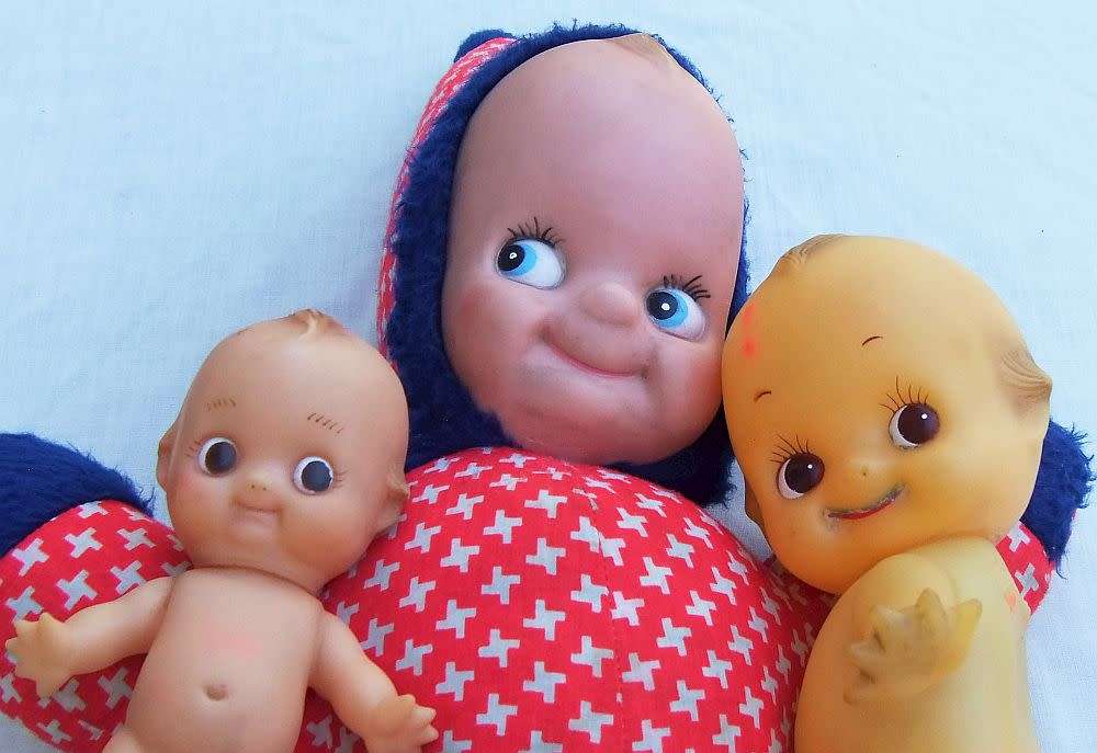 Three vintage Kewpie dolls for display