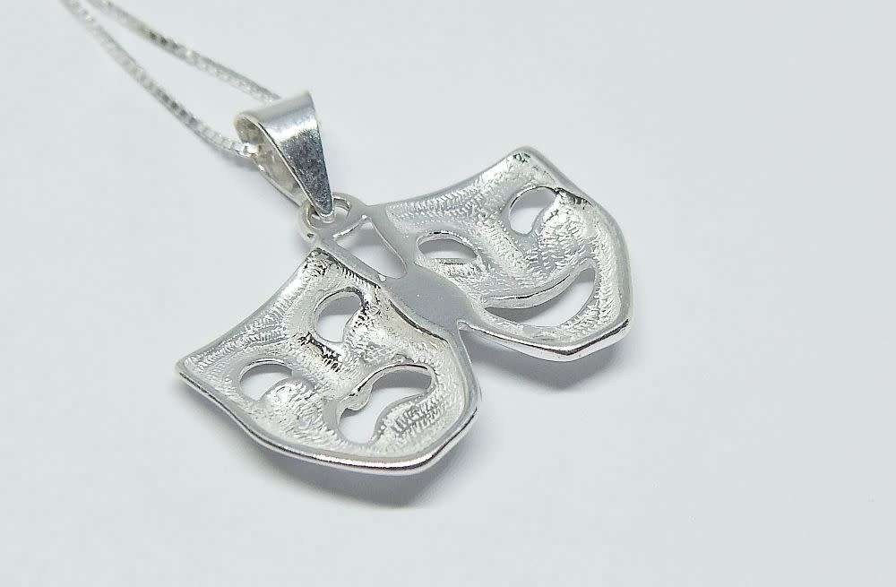 A genuine sterling silver necklace with sterling silver double mask pendant - Brand new