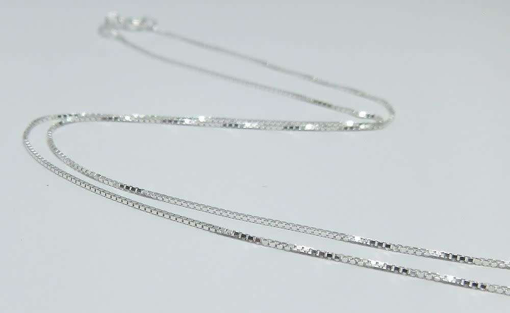 A genuine sterling silver necklace with sterling silver double mask pendant - Brand new