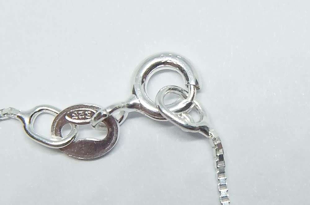 A genuine sterling silver necklace with sterling silver double mask pendant - Brand new