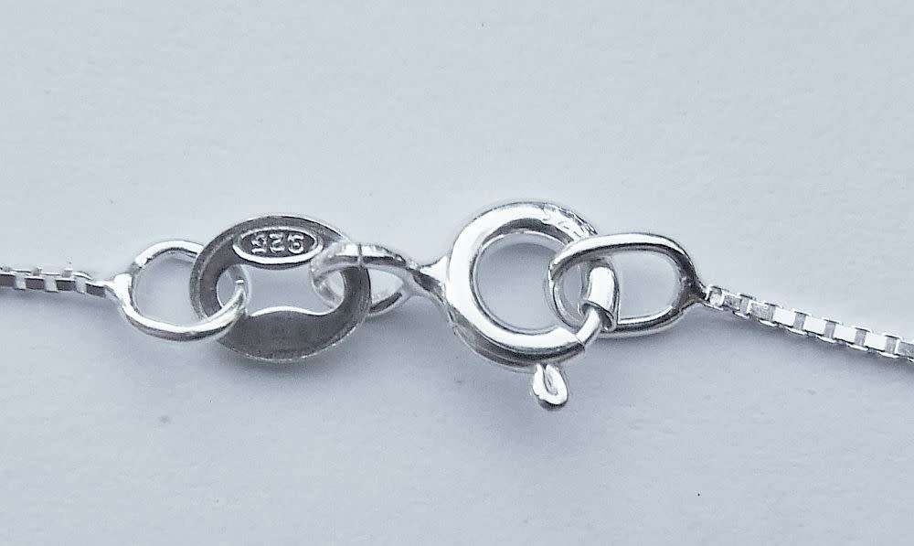 A genuine sterling silver necklace and pendant with tree of life motif - Brand new - Boxed