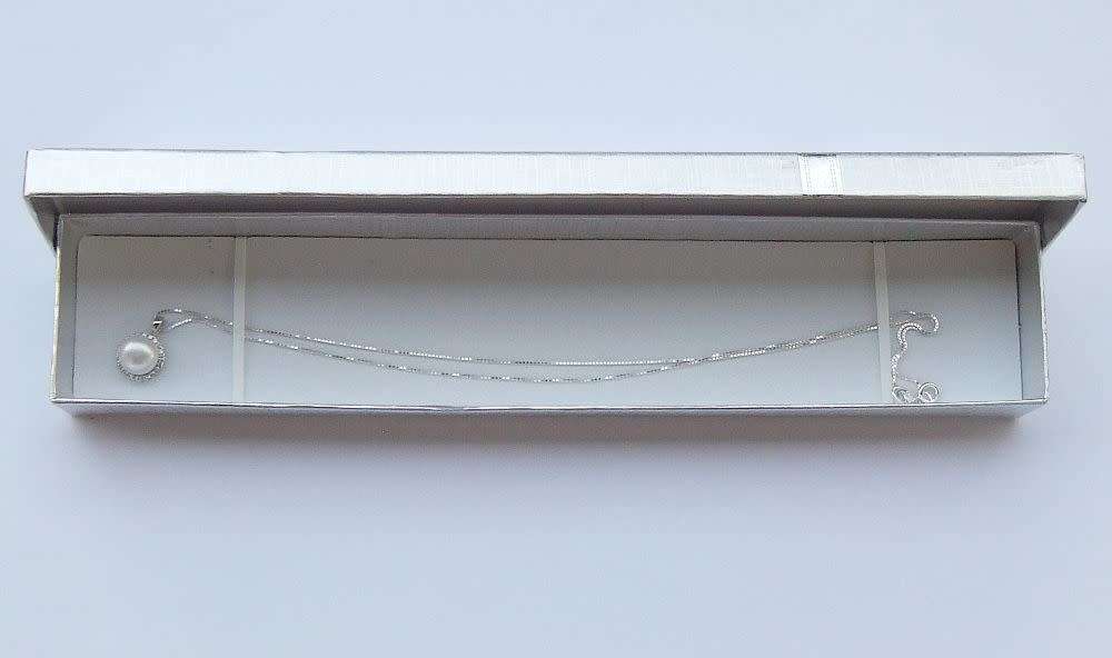 A genuine sterling silver necklace and genuine Mabe pearl pendant - Brand new - Boxed