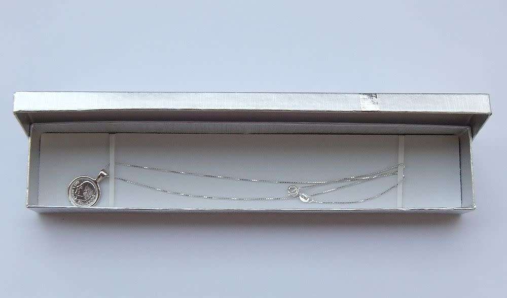 A genuine sterling silver necklace and sterling silver coin pendant - Brand new - Boxed