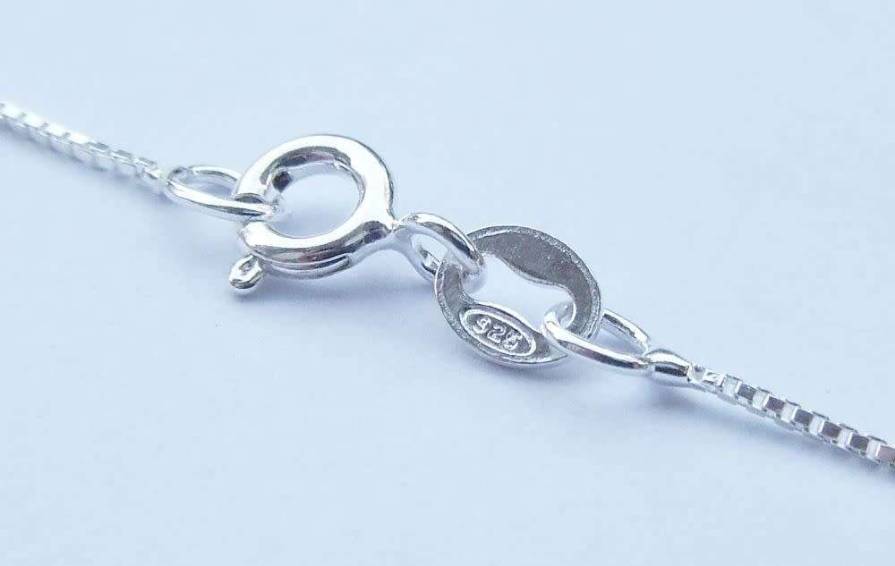 A genuine sterling silver necklace and sterling silver coin pendant - Brand new - Boxed