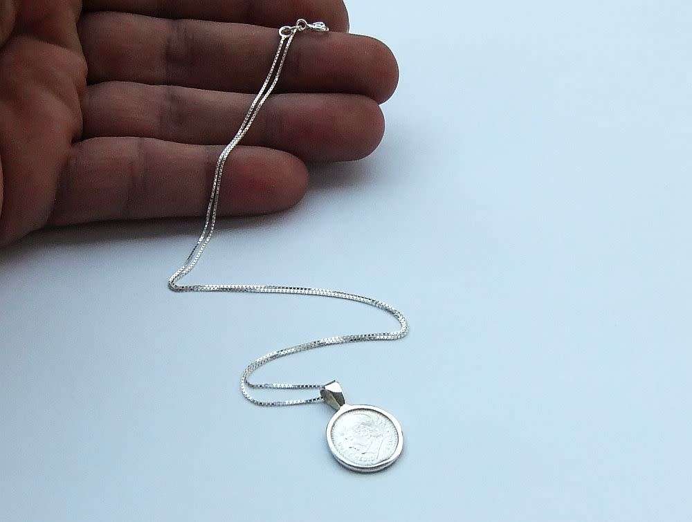 A genuine sterling silver necklace and sterling silver coin pendant - Brand new - Boxed