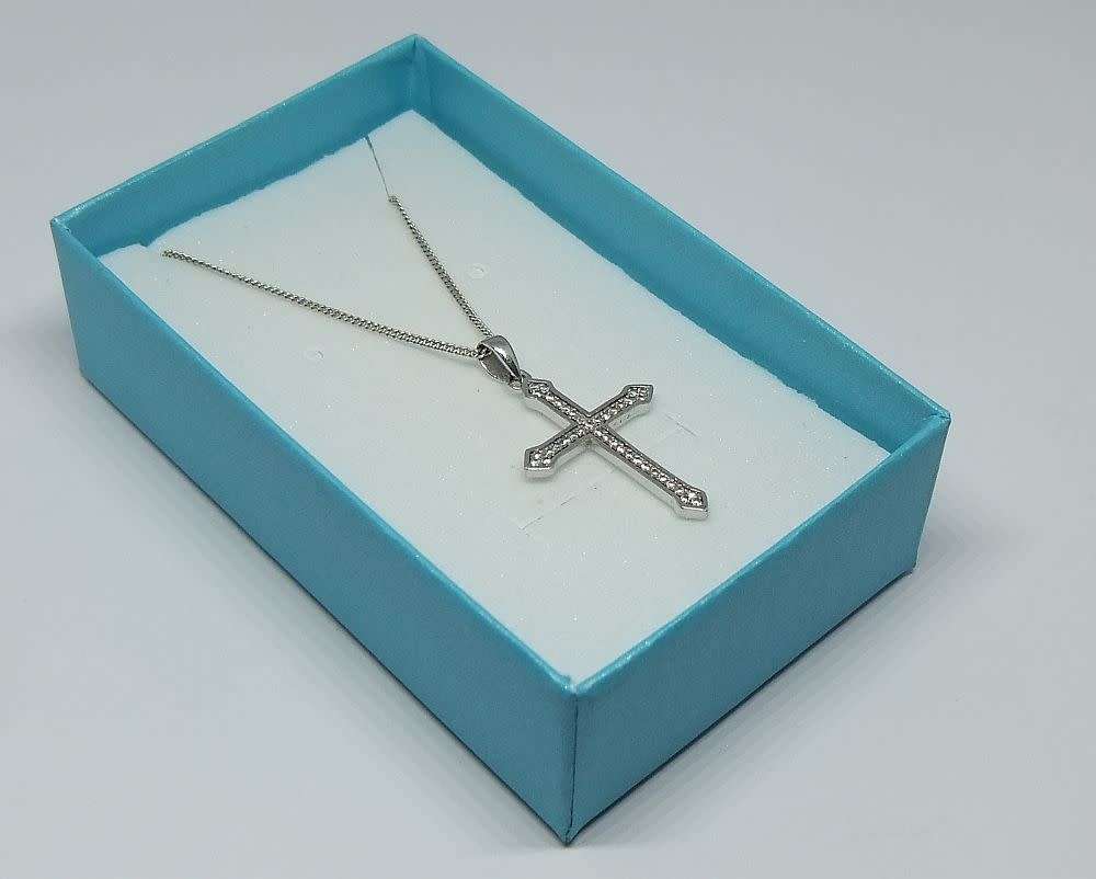 A genuine sterling silver necklace and cross pendant with faceted clear insets plus gift box