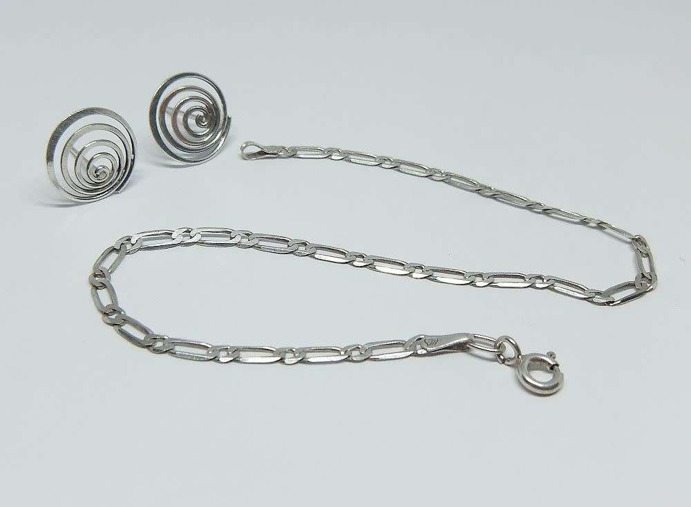 A pair of sterling silver spiral earrings and a sterling silver bracelet - Bid for both
