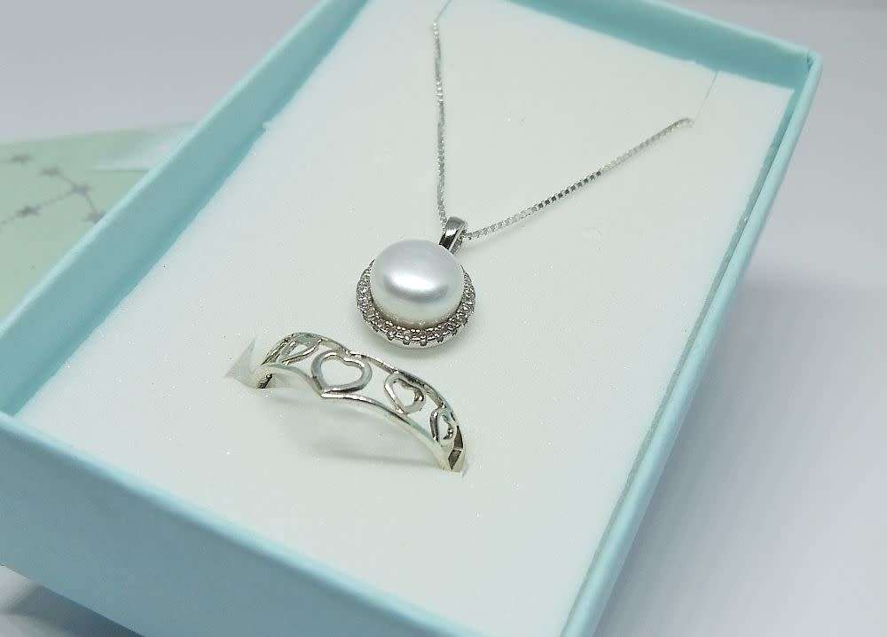 A genuine sterling silver necklace with mabe pearl pendant + sterling silver heart motif ring