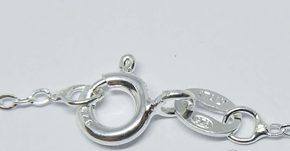 A sterling silver necklace with a sterling silver coin pendant + sterling silver Claddagh ring - NEW