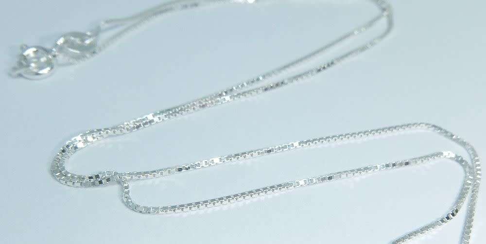 A genuine sterling silver necklace and sterling silver coin pendant - Brand new - Last one