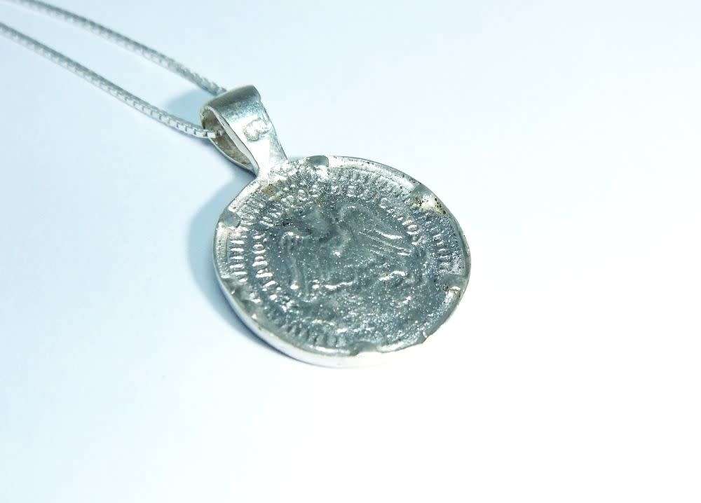A genuine sterling silver necklace and sterling silver coin pendant - Brand new - Last one