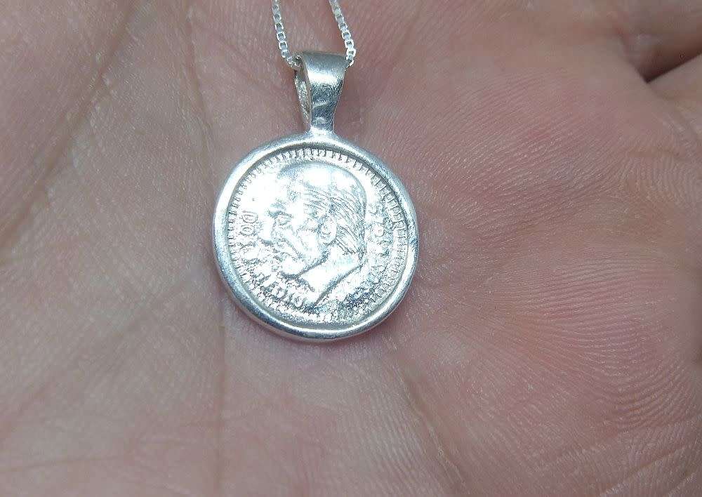 A genuine sterling silver necklace and sterling silver coin pendant - Brand new - Last one