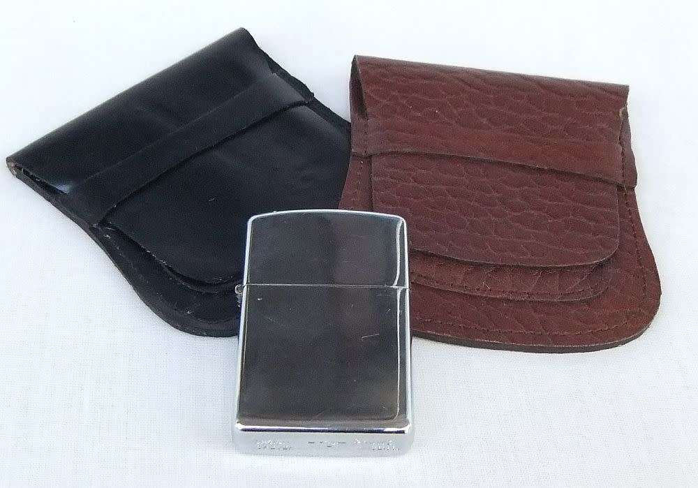 Two genuine leather Zippo holders plus a Star windproof lighter - never used - gift idea