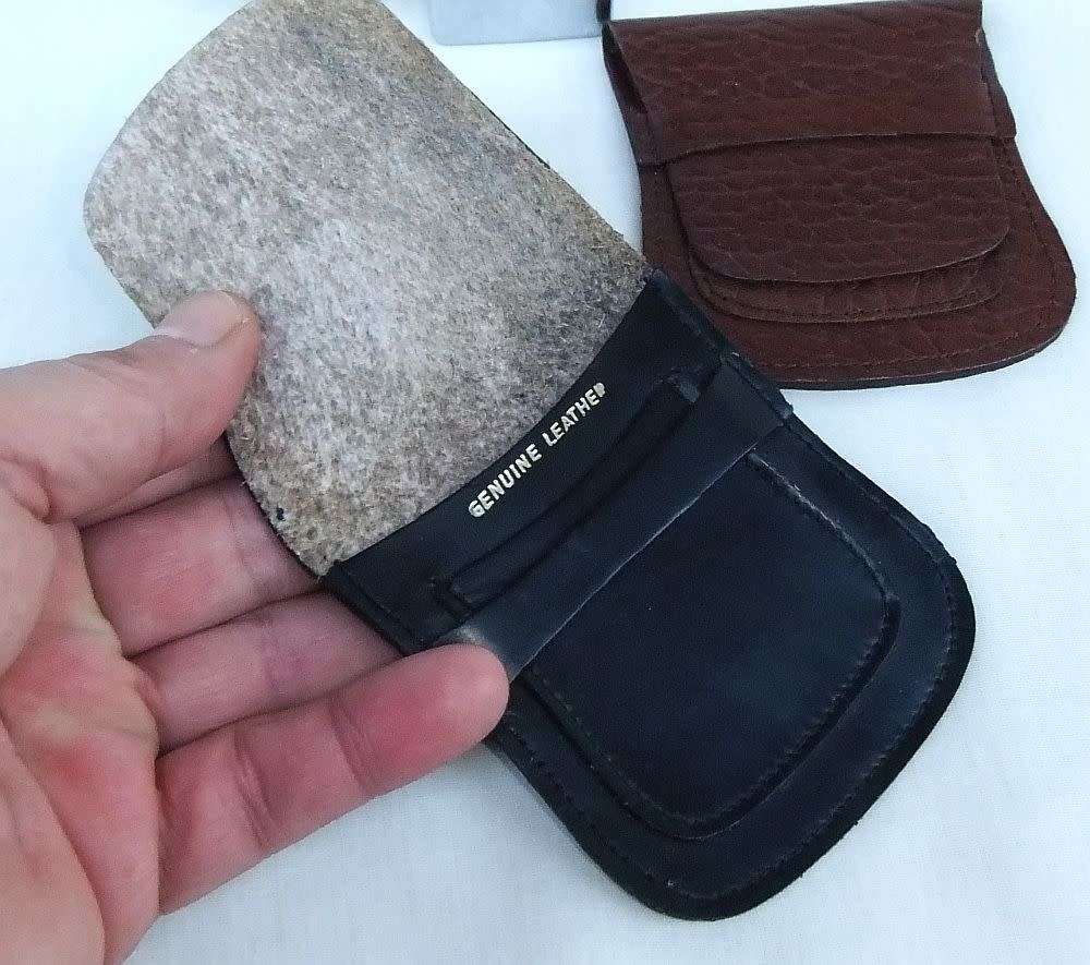 Two genuine leather Zippo holders plus a Star windproof lighter - never used - gift idea