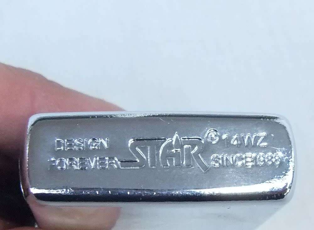 Two genuine leather Zippo holders plus a Star windproof lighter - never used - gift idea