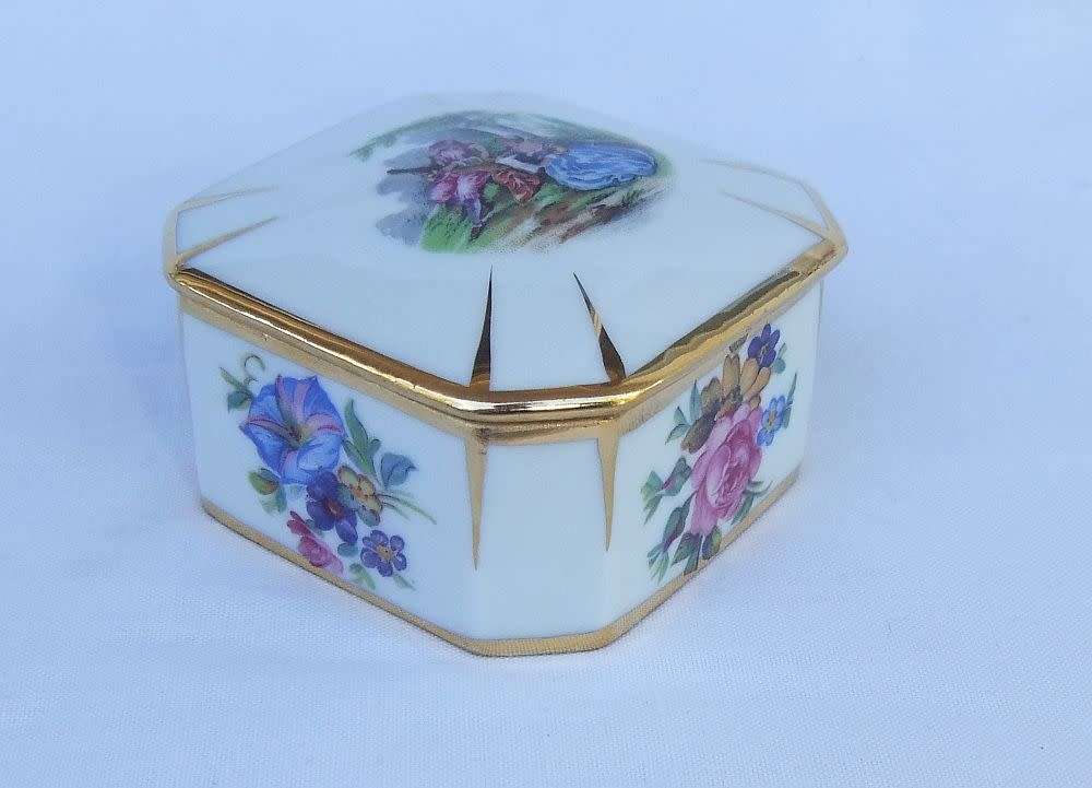 A beautifully decorated vintage Limoges of France porcelain trinket box