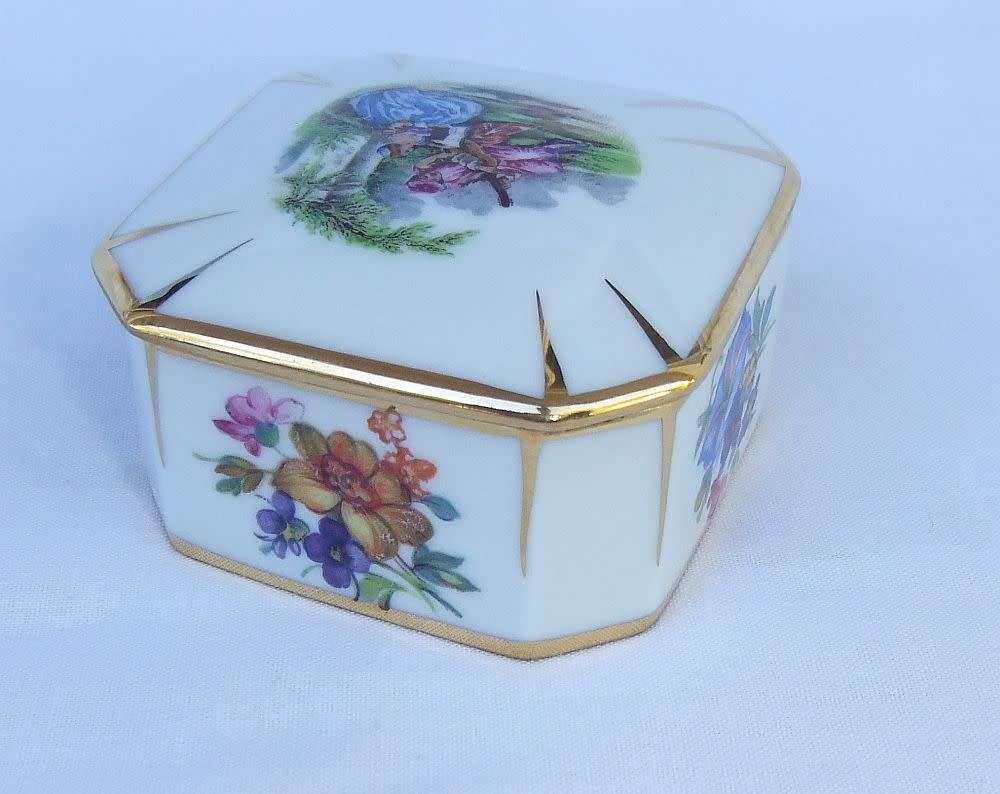 A beautifully decorated vintage Limoges of France porcelain trinket box
