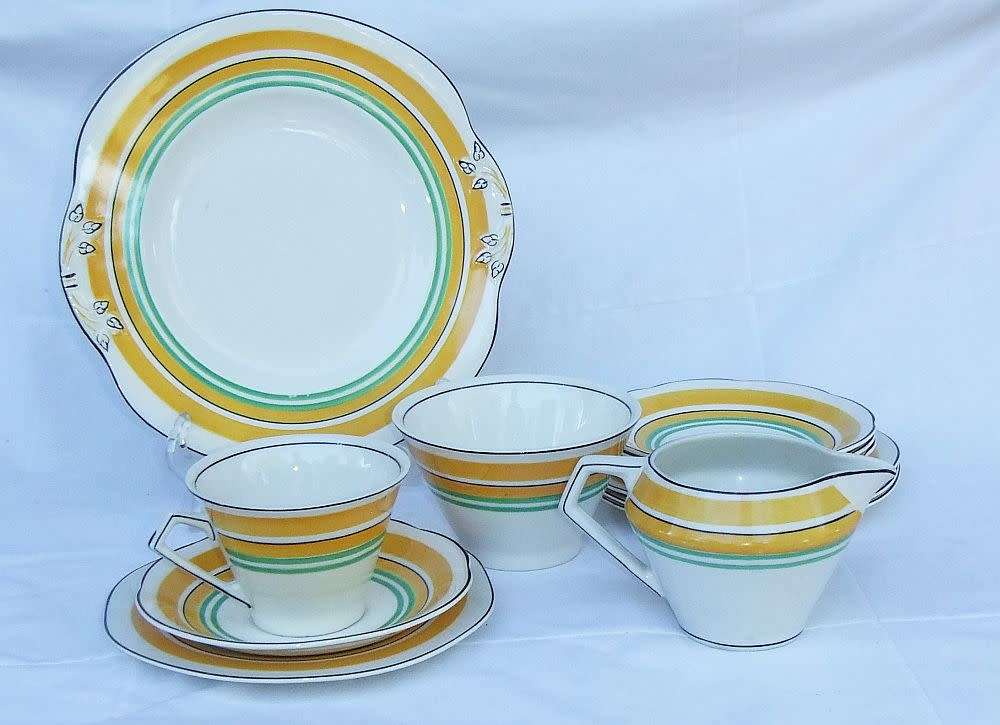 A rare lot of Art Deco period porcelain by Woods Ivory Ware including a trio & snack dish