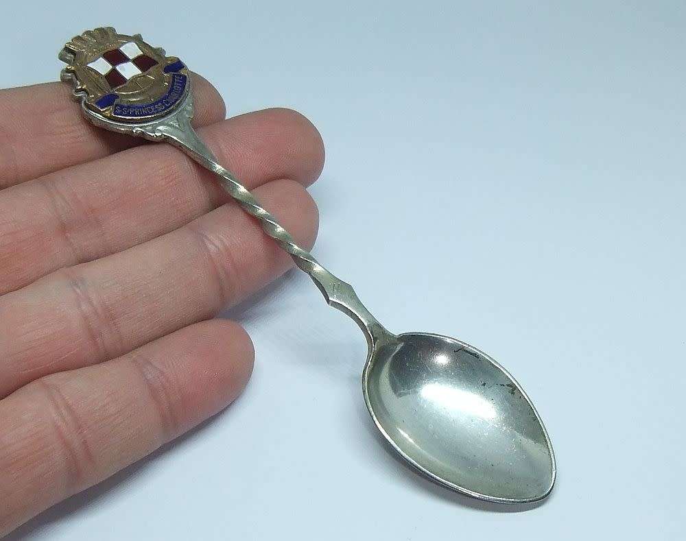 A vintage commemorative silverplate teaspoon made for the S.S Princess Charlotte Ocean Liner