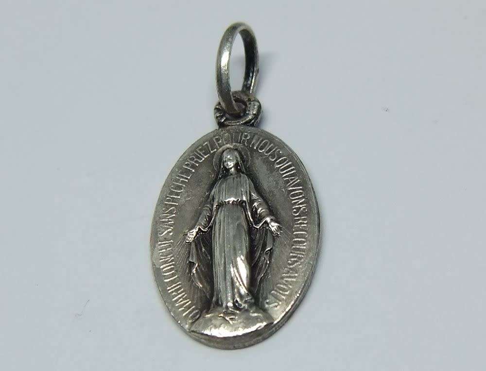 An insanely cute highly detailed vintage solid metal religious pendant / medallion made in France