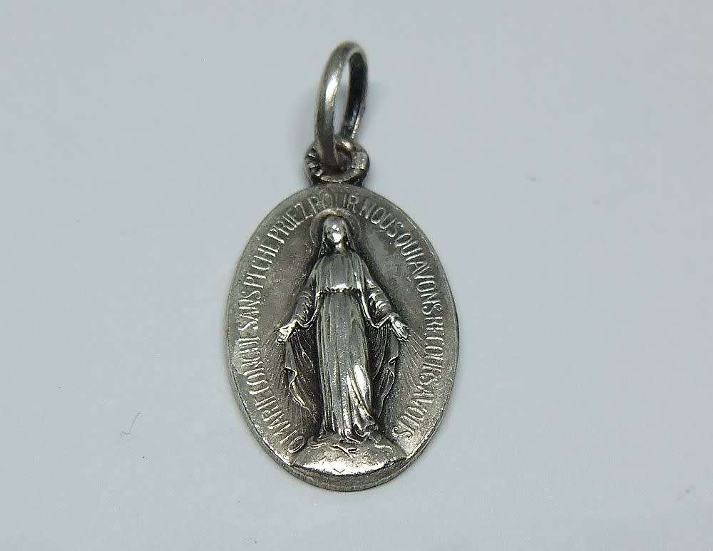 An insanely cute highly detailed vintage solid metal religious pendant / medallion made in France