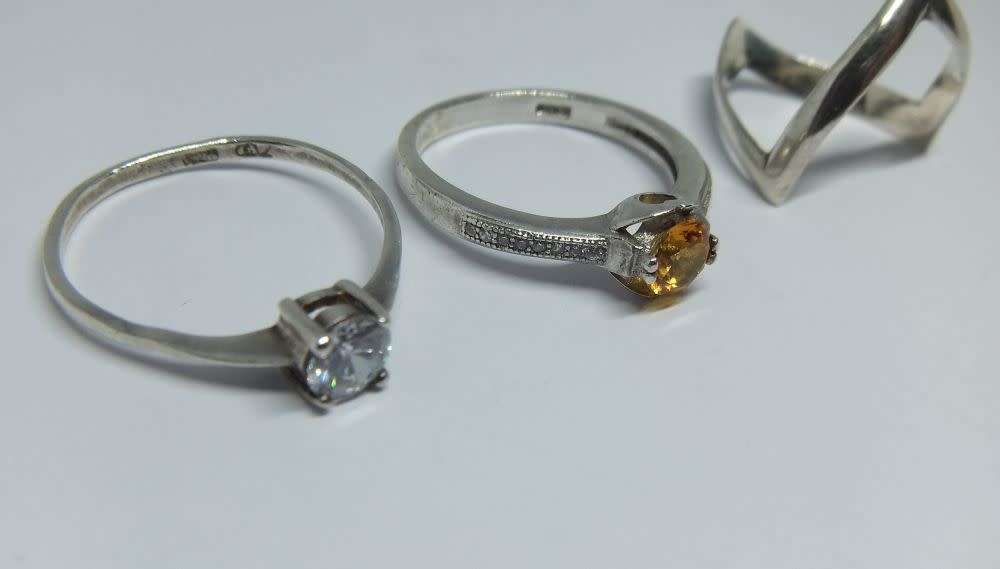 A solid sterling silver ring set with a faceted November birthstone + 2 free sterling silver rings