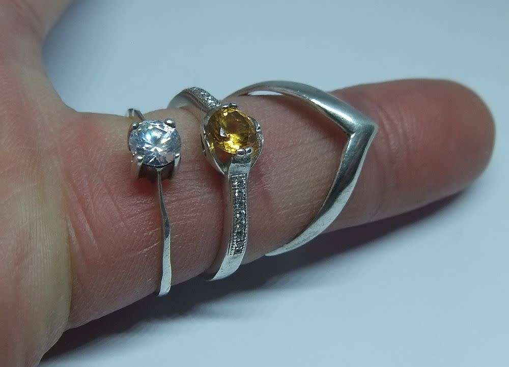 A solid sterling silver ring set with a faceted November birthstone + 2 free sterling silver rings
