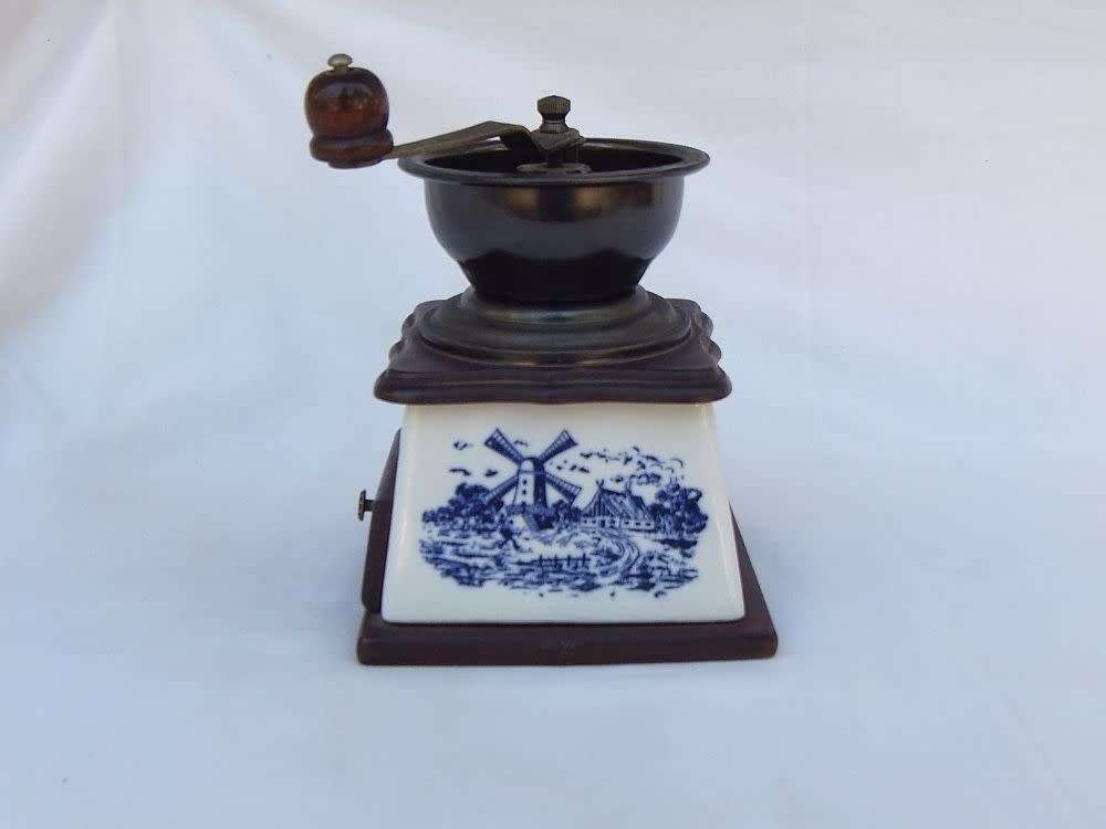 A lovely vintage `KOFFIE`  grinder with Delft style windmill decoration