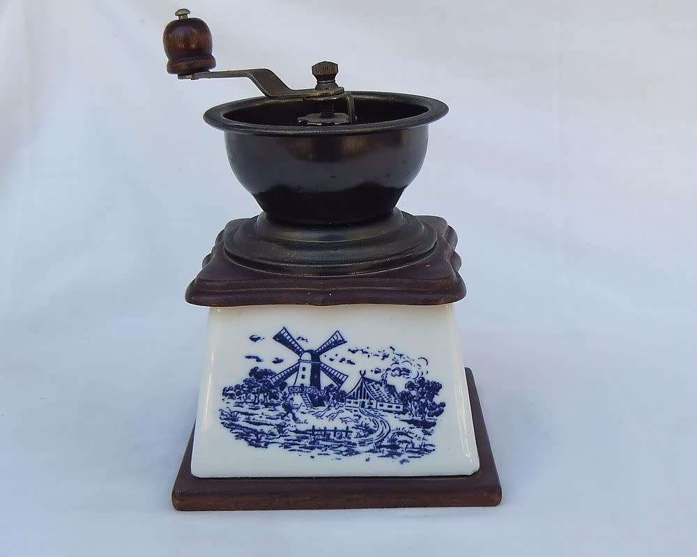A lovely vintage `KOFFIE`  grinder with Delft style windmill decoration