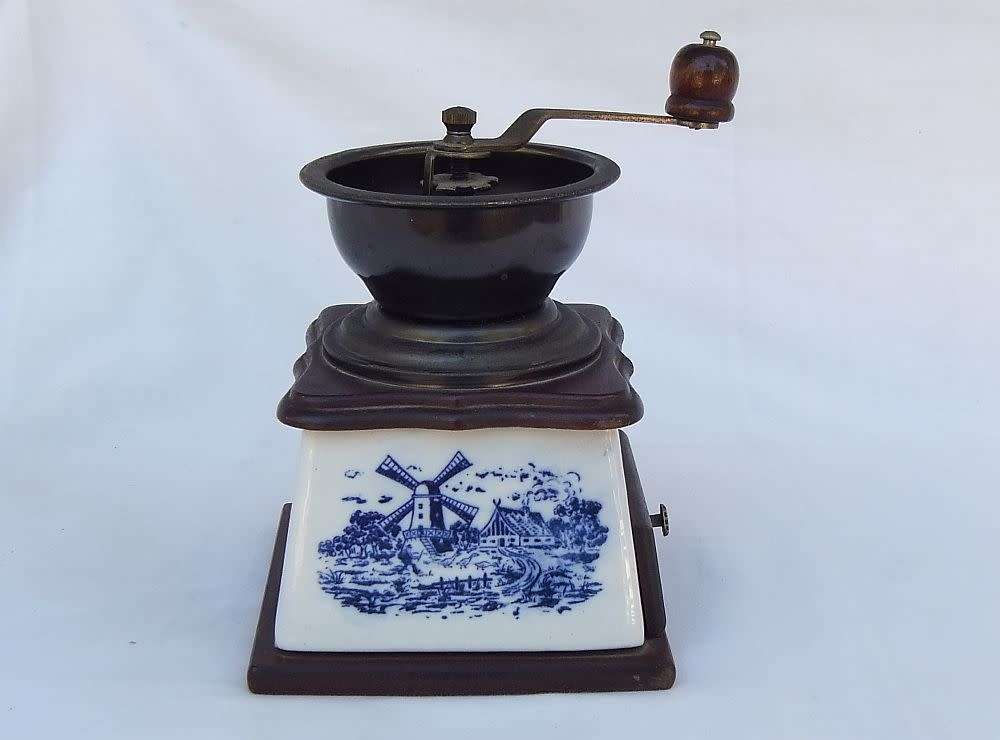 A lovely vintage `KOFFIE`  grinder with Delft style windmill decoration