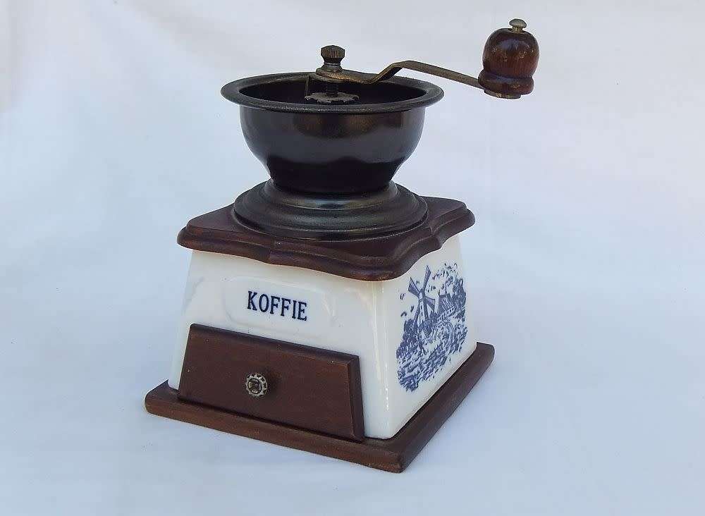 A lovely vintage `KOFFIE`  grinder with Delft style windmill decoration