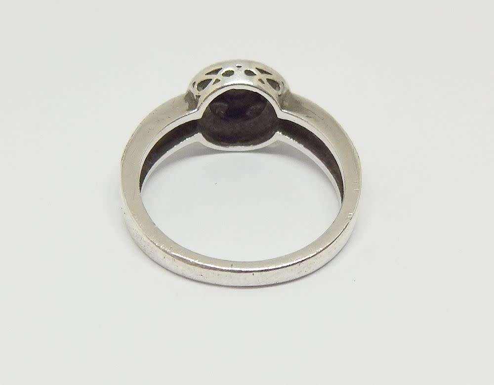 A gorgeous genuine sterling silver ring with gold accent and tiny faceted inset