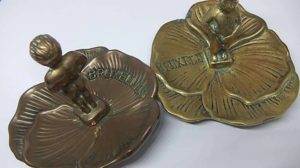 Too cute !! Two old solid brass / bronze boy from Bruxelles themed coin or ring dishes