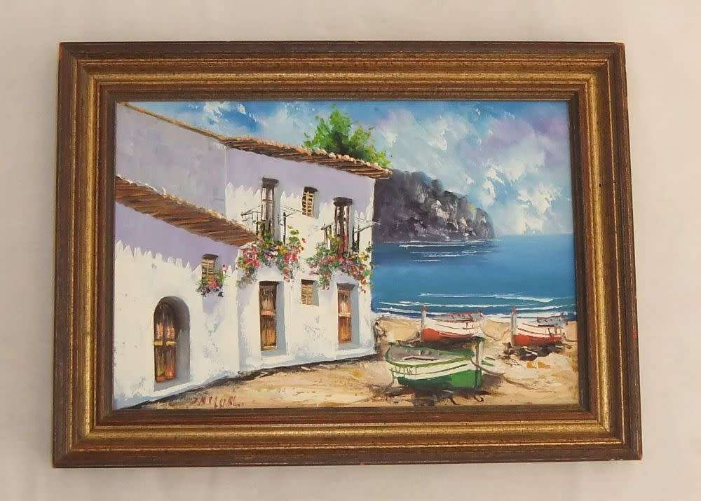 An original signed oil on board Spanish coastal village painting by Spanish artist Juan Pascual