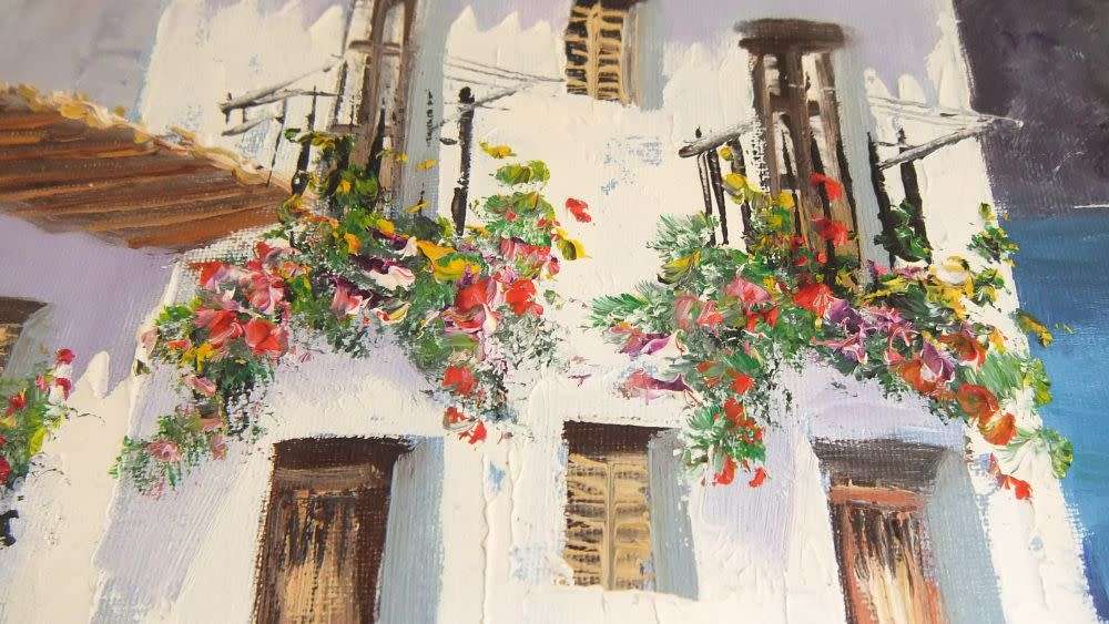 An original signed oil on board Spanish coastal village painting by Spanish artist Juan Pascual