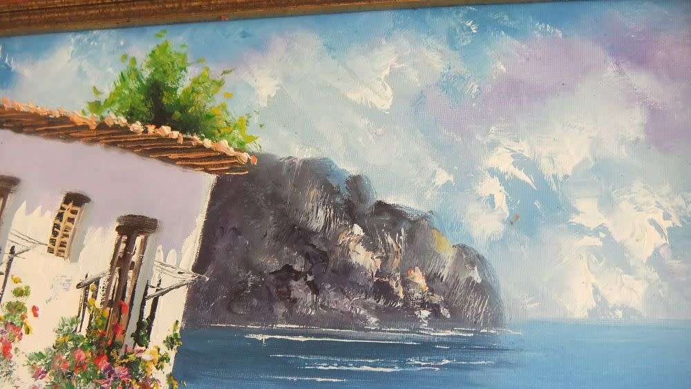 An original signed oil on board Spanish coastal village painting by Spanish artist Juan Pascual